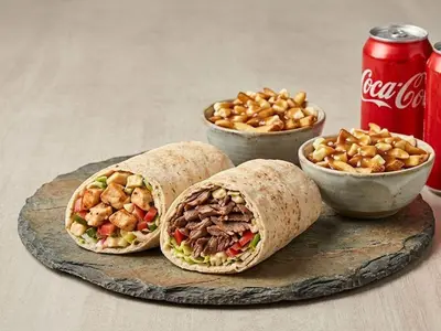Trio #10 — 2 pitas Shish Taouk, Shawarma or Gyros + 2 mini poutines + 2 drinks