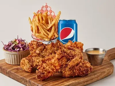25 Pcs + Fries + 3 Sauces + 2 Pepsi