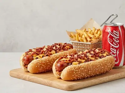 Trio #9 — 2 hot dogs supreme cheese & bacon + fries + drink